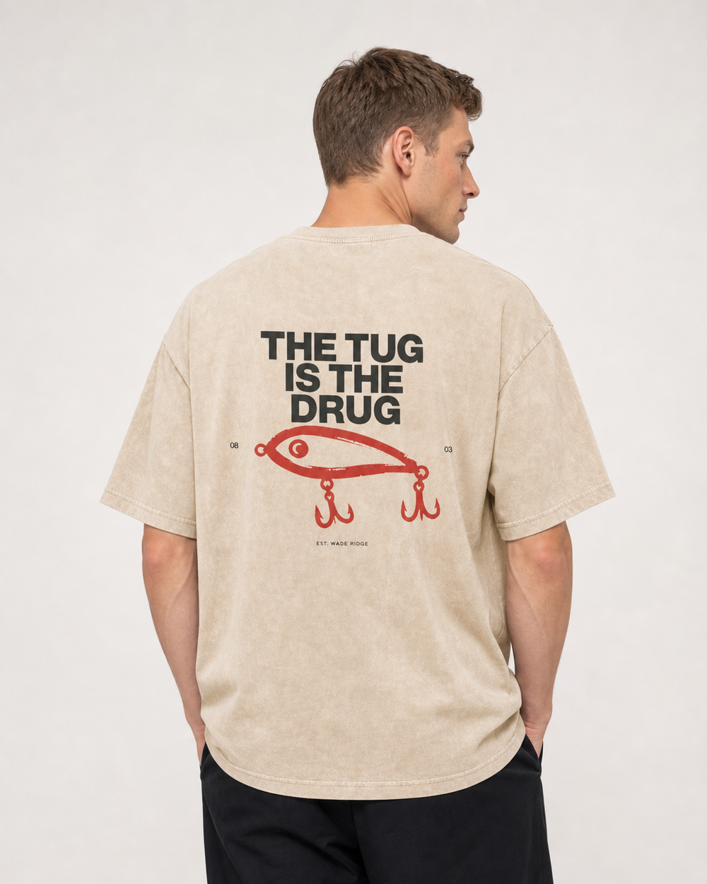The Tug Is The Drug — Brushed Lure washed tee — washed bone, worn, front