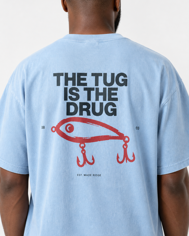 The Tug Is The Drug — Brushed Lure washed tee — washed light blue, worn, side