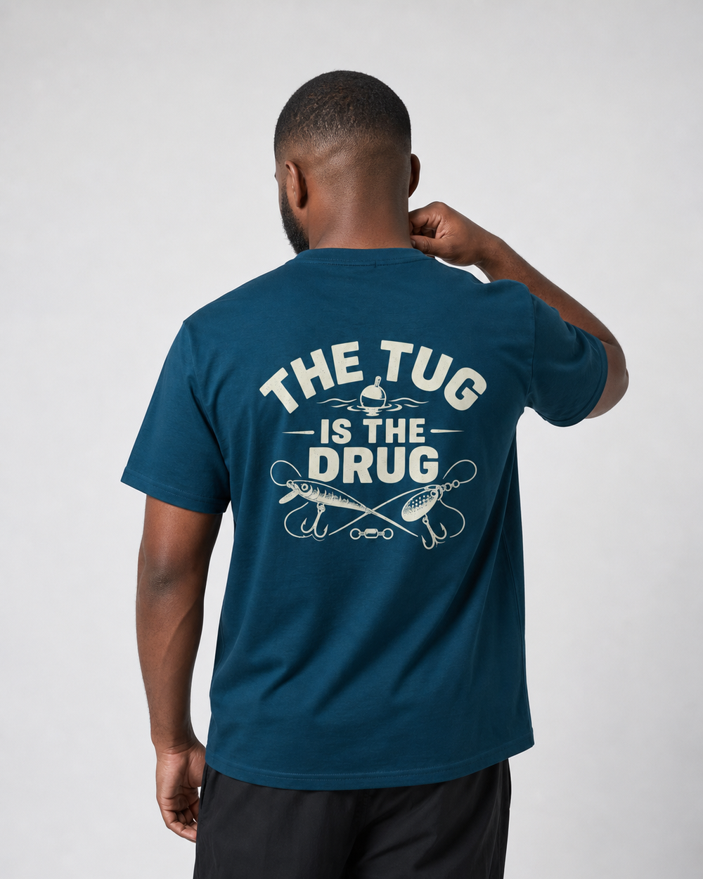 The Tug Is The Drug — Crossed Lures tee — midnight navy, worn, front