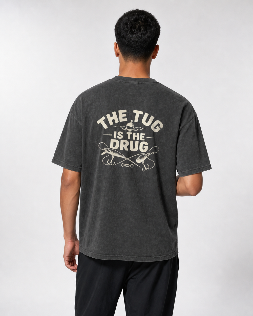 The Tug Is The Drug — Crossed Lures washed tee — washed black, worn, front