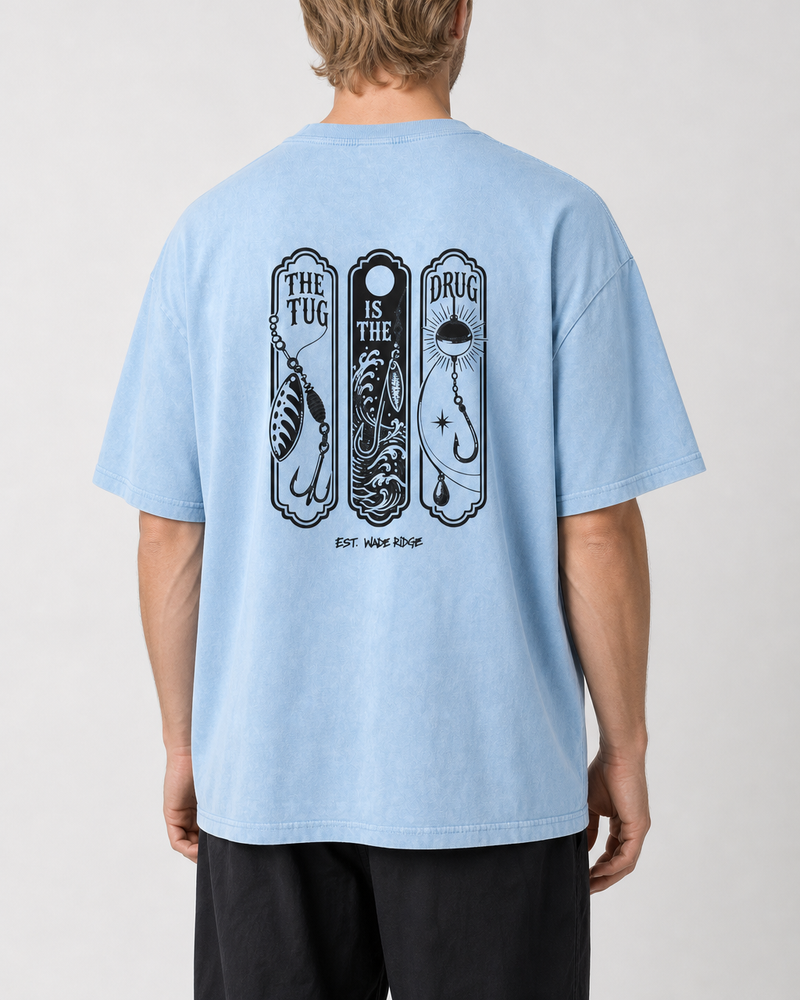 The Tug Is The Drug — Lure Panels washed tee — washed light blue, worn, side