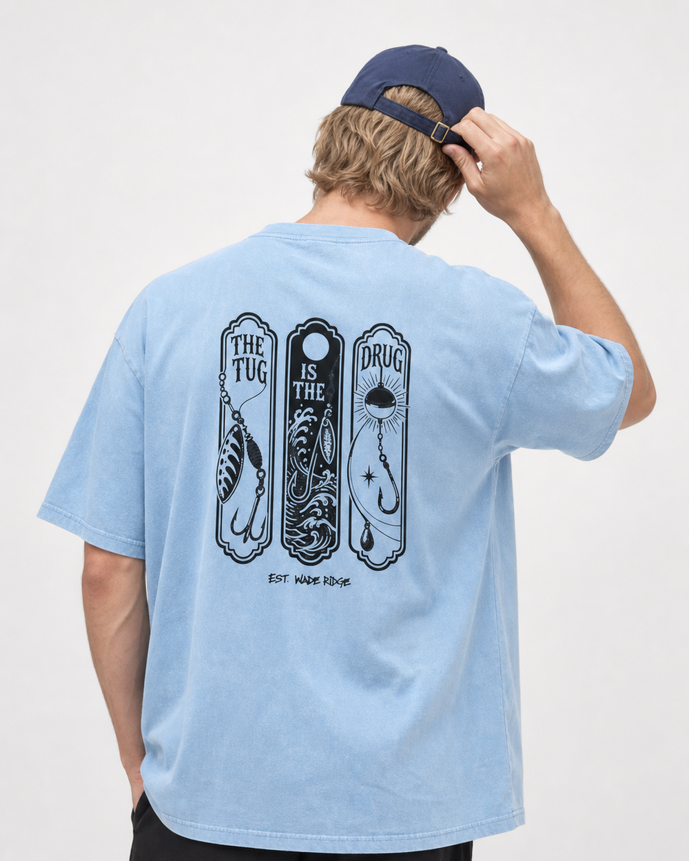 The Tug Is The Drug — Lure Panels washed tee — washed light blue, worn, front