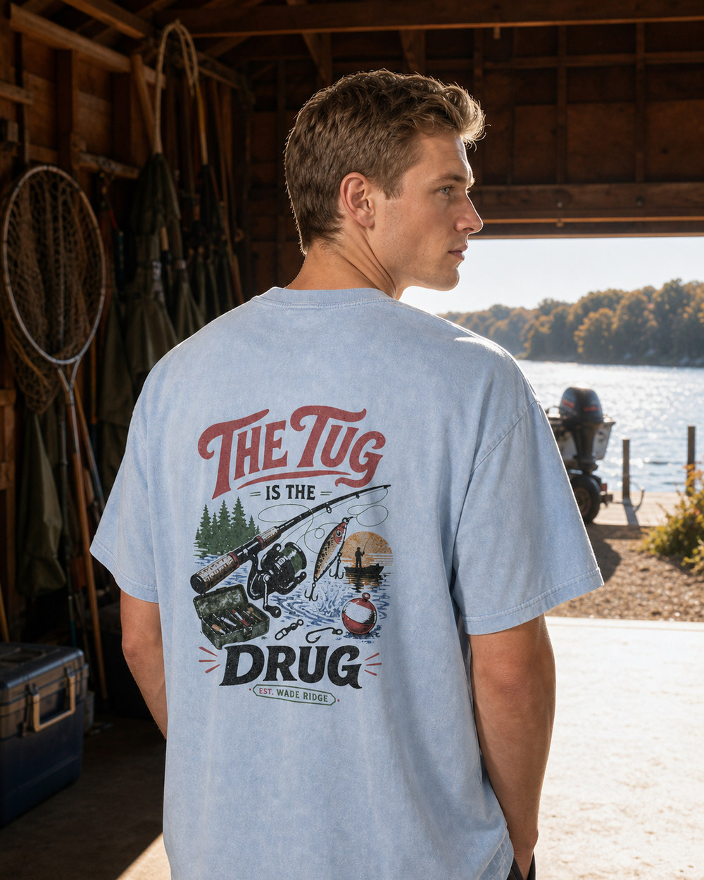 The Tug Is The Drug — Lake Day washed tee — washed light blue, worn, front