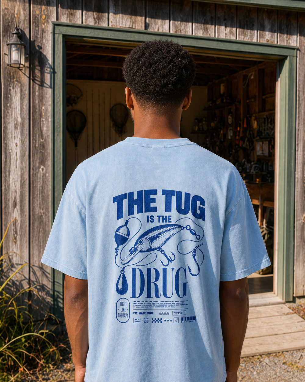 The Tug Is The Drug — Deep Diver washed tee — washed light blue, worn, front