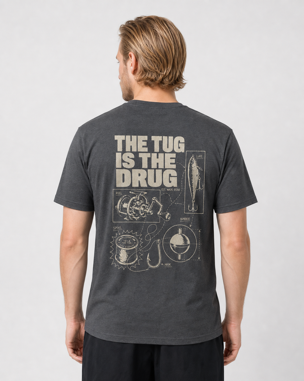The Tug Is The Drug — Tackle Notes tee — dark heather, worn, front