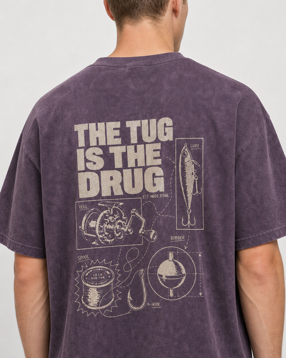 The Tug Is The Drug — Tackle Notes washed tee — washed violet, worn, side