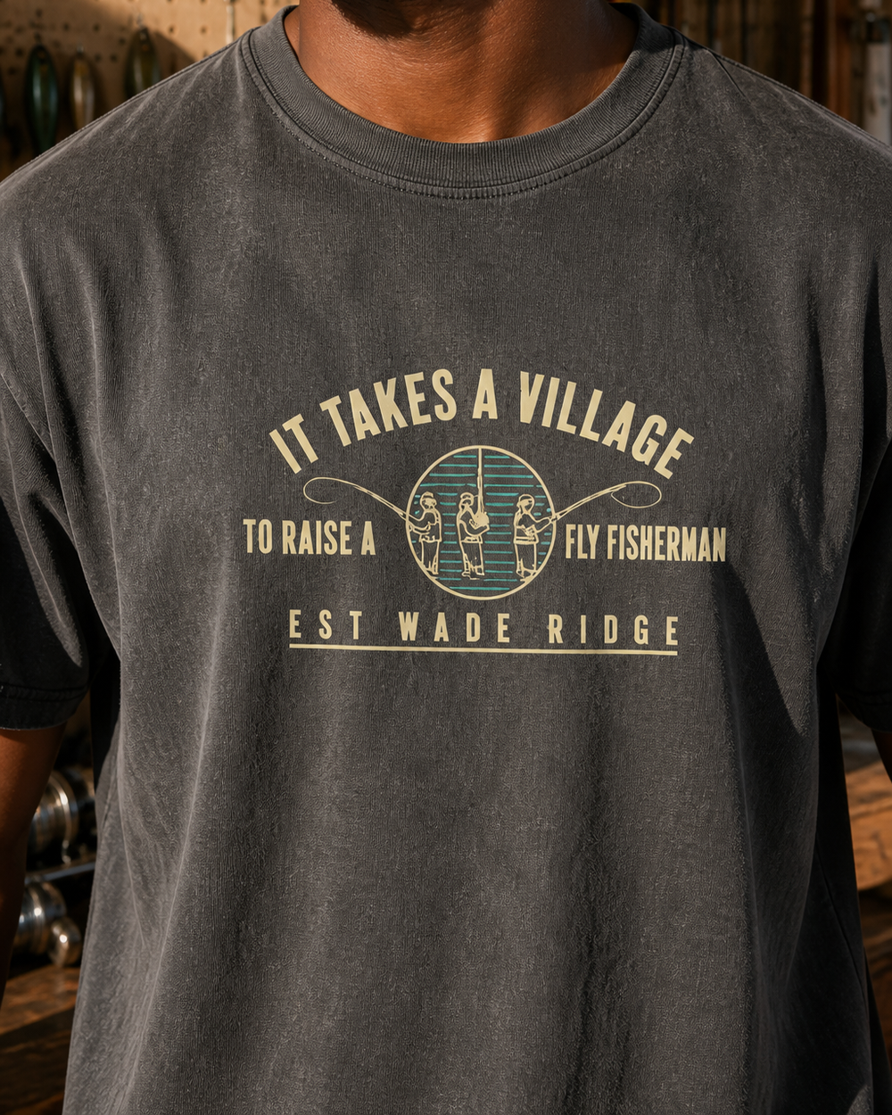 It Takes A Village washed tee — washed black, worn, side