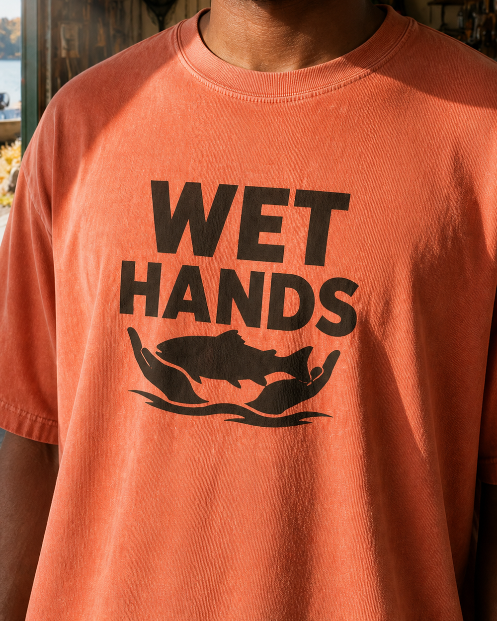 Wet Hands Bold washed tee — worn, side
