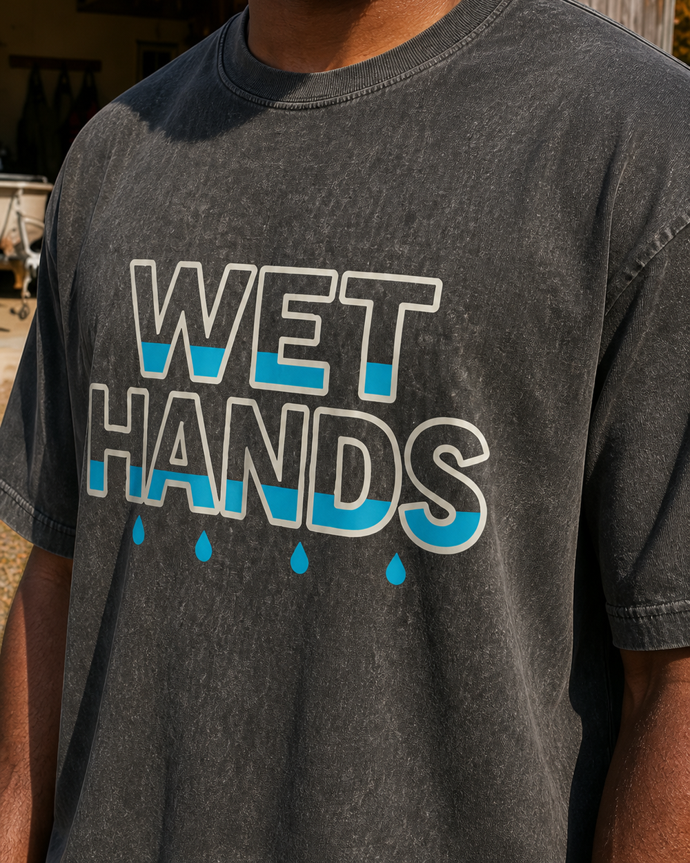 Wet Hands washed tee — washed black, worn, side