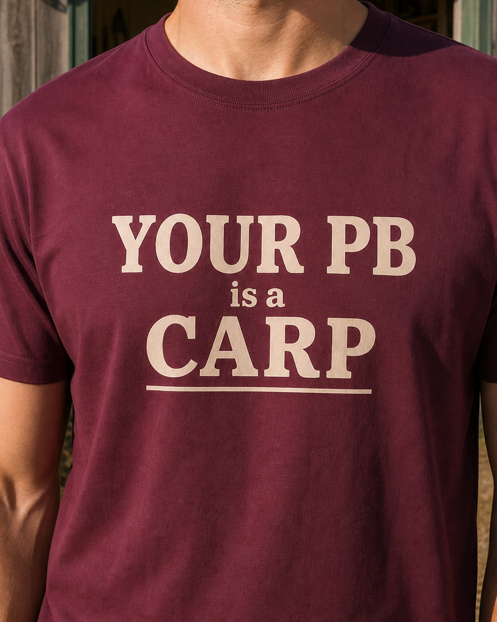 Your PB Is A Carp Stacked tee — maroon, worn, side